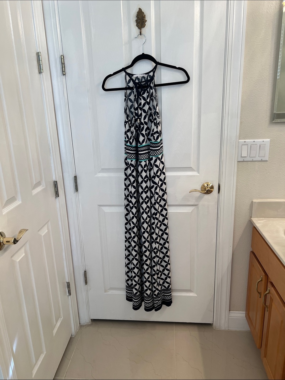 Studio One Black and White Geometric Halter Maxi Dress with Teal Accents